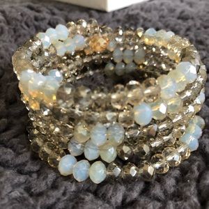 Beaded infinity stacked bracelet tans NWOT in box